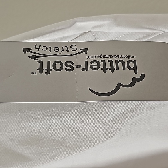 Scrubs, butter-soft. White with lots of pockets.  Cuff style. Size small… - Picture 3 of 8